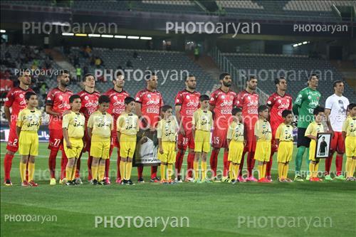 <span style='background: #33747a;box-shadow: 2px 3px 5px black;font-weight: 300;font-size: 10px;border-radius: 2px;margin: 2px;color: #fff;padding: 2px 5px;font - size: 10px;line - height: 22px; '>ایستاده تیم پرسپولیس</span> <span style='background: #33747a;box-shadow: 2px 3px 5px black;font-weight: 300;font-size: 10px;border-radius: 2px;margin: 2px;color: #fff;padding: 2px 5px;font - size: 10px;line - height: 22px; '>محمد انصاری</span> <span style='background: #33747a;box-shadow: 2px 3px 5px black;font-weight: 300;font-size: 10px;border-radius: 2px;margin: 2px;color: #fff;padding: 2px 5px;font - size: 10px;line - height: 22px; '>مهدی طارمی</span> 